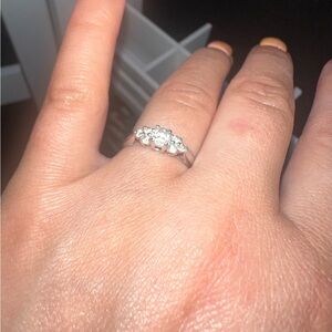 Classic Silver Ring with Diamond Center Stone and Side Accents